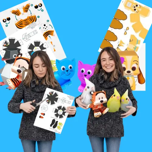 Alina segurando animais de papel
